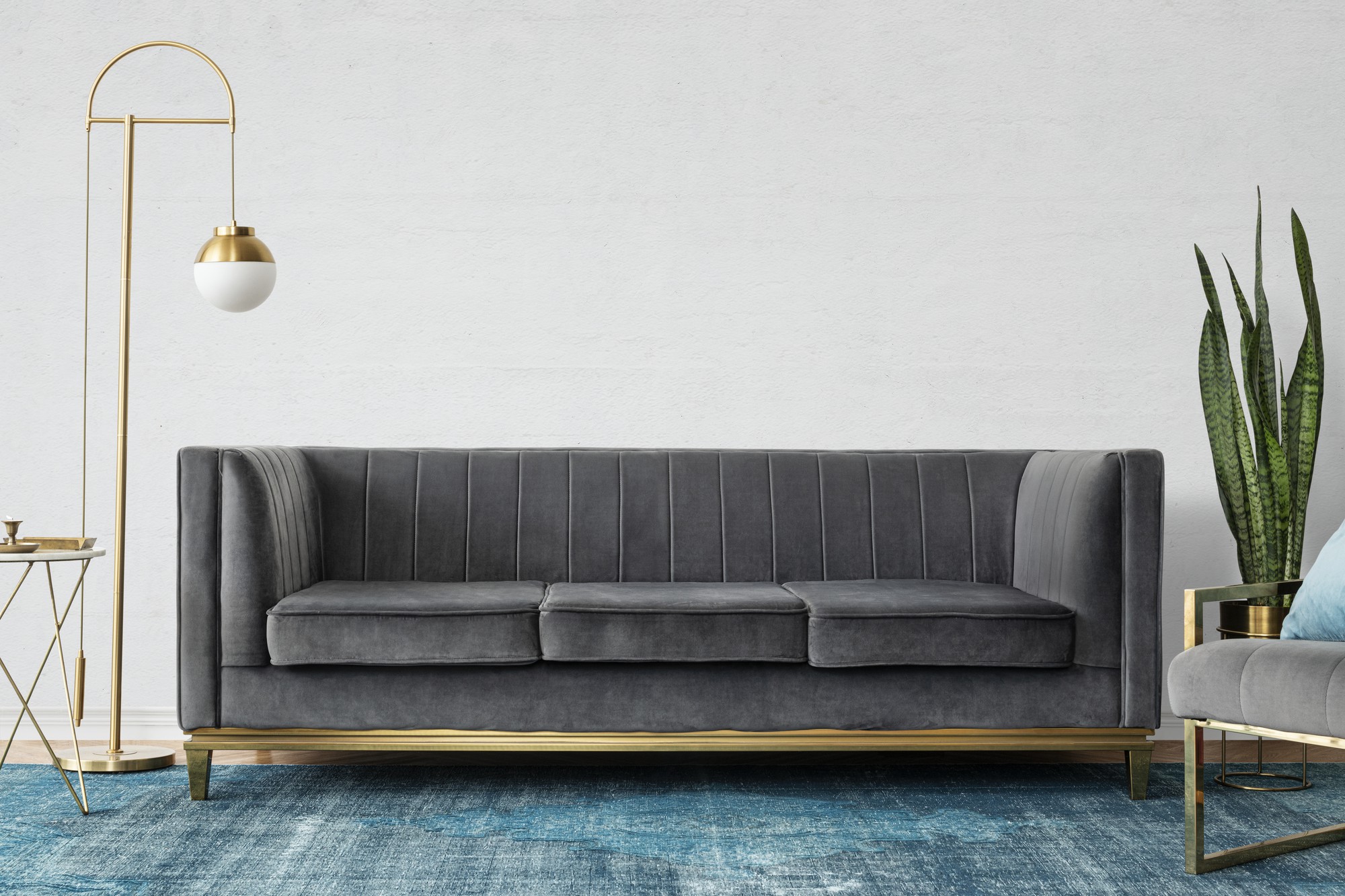 20230813121428_[fpdl.in]_chic-mid-century-modern-luxury-aesthetics-living-room-with-gray-velvet-couch-blue-rug_53876-128133_full